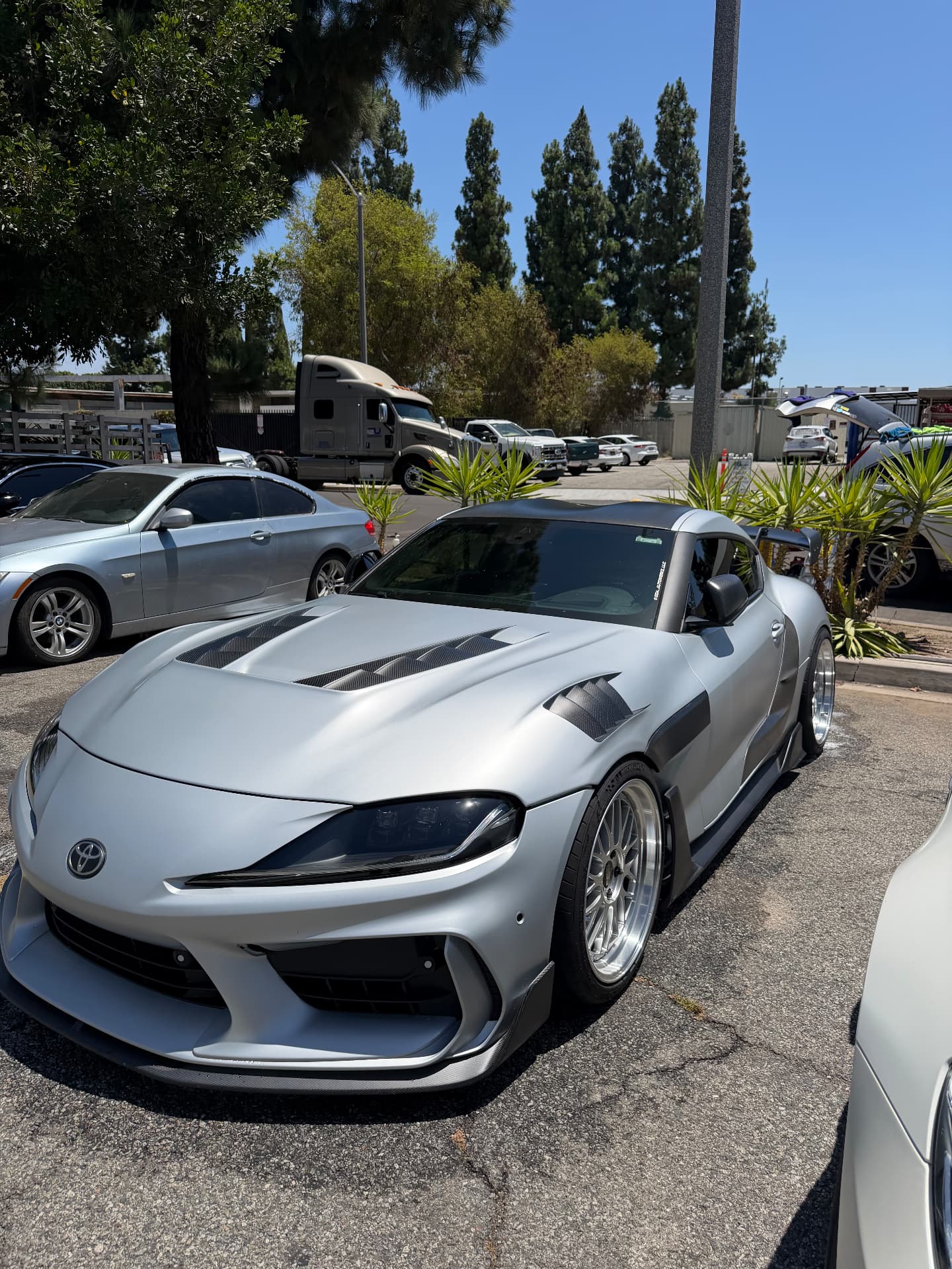 Silver widebody sports car after detail