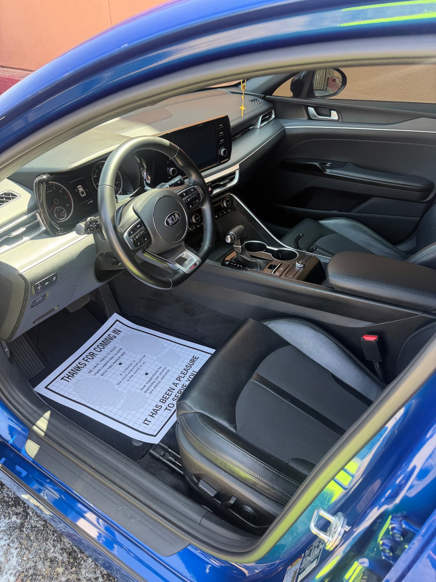 Blue sedan interior cleaned and protected
